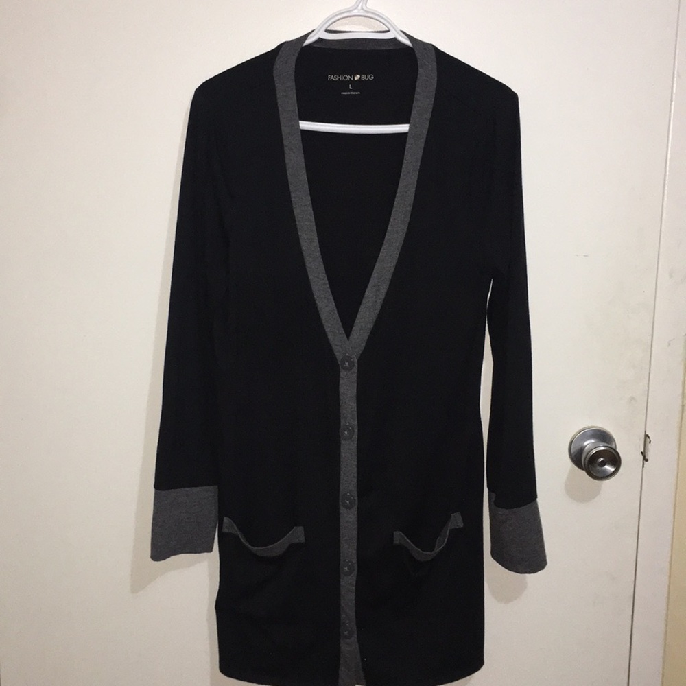 Button up black and grey cardigan.